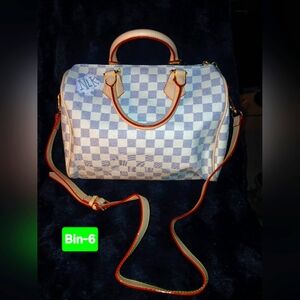 Checkered Handbag with Red Accents